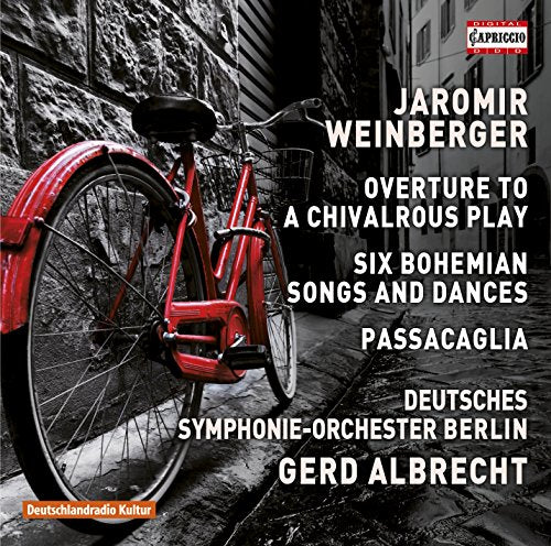 CD cover featuring a red bicycle against a blurred urban background.
