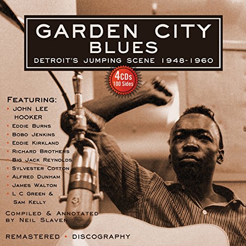 CD cover for "Garden City Blues" featuring a vintage microphone and musician.