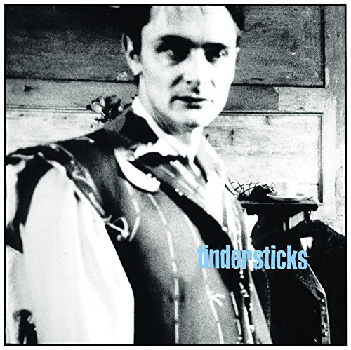 Black and white album cover featuring a man in a vest, "Tindersticks" text.