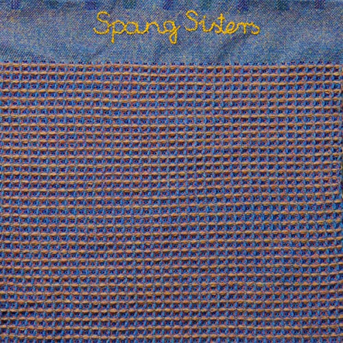 Spang Sisters album cover: textured blue and gold woven pattern.
