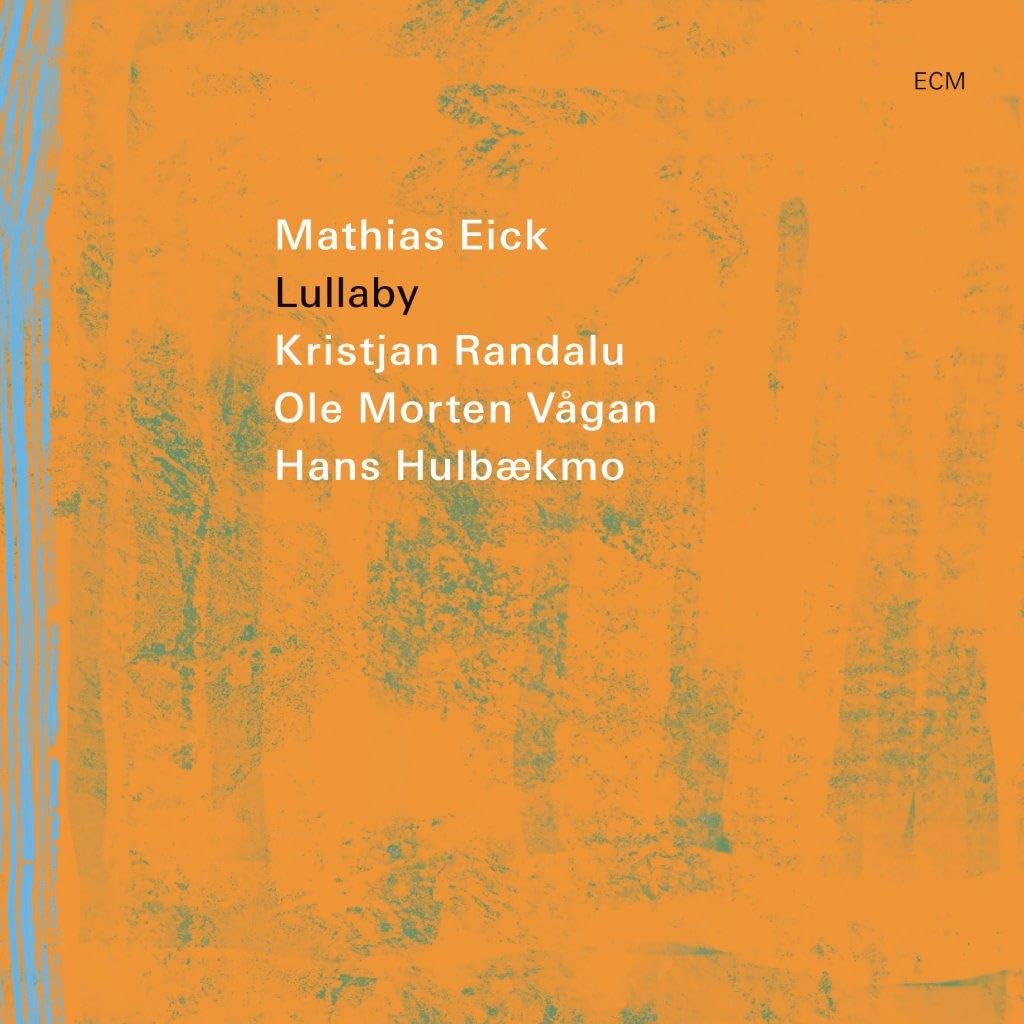 Album cover for Mathias Eick’s “Lullaby” with orange textured background.