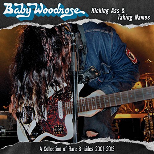 CD cover: musician with long hair playing a red electric guitar.