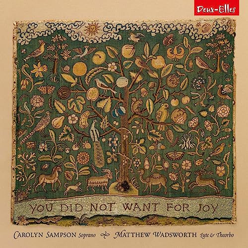 CD cover depicting a detailed, embroidered tree with animals and fruit.