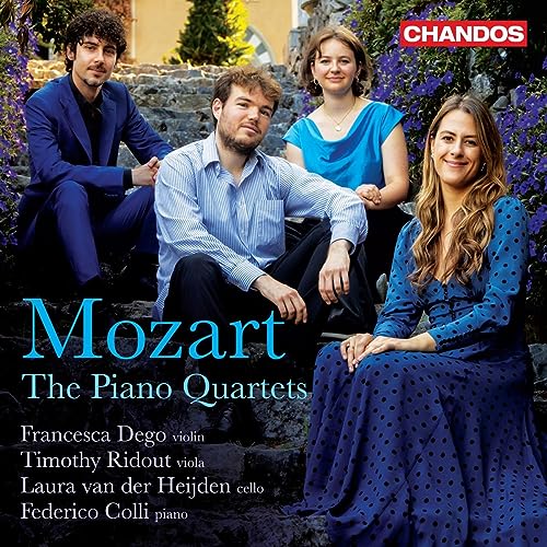 CD cover featuring four musicians seated on stone steps, with text “Mozart”.