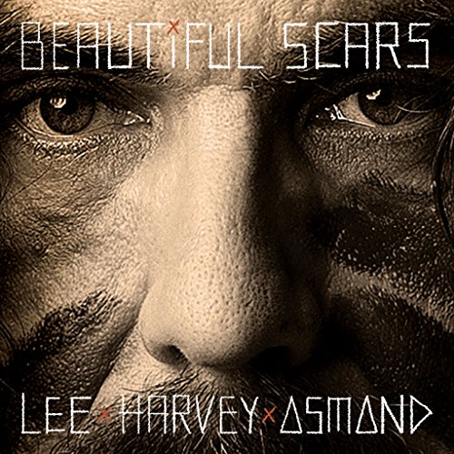 Close-up of a man’s face with scars, album cover for “Beautiful Scars.”