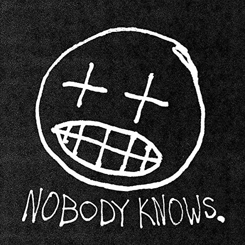 Black and white album cover with a crude, hand-drawn face and text.