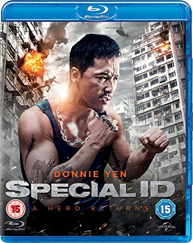 Donnie Yen in a fighting stance against a backdrop of a burning urban building.