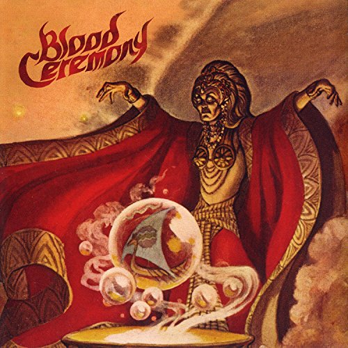 Album cover: a woman in red robes performing a magical ritual.