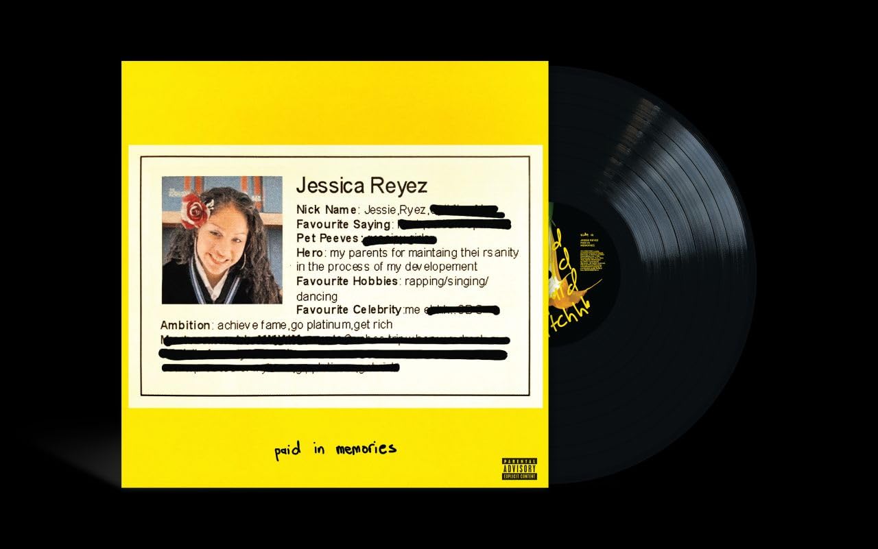Jessie Reyez vinyl record with yellow cover and portrait, parental advisory label.