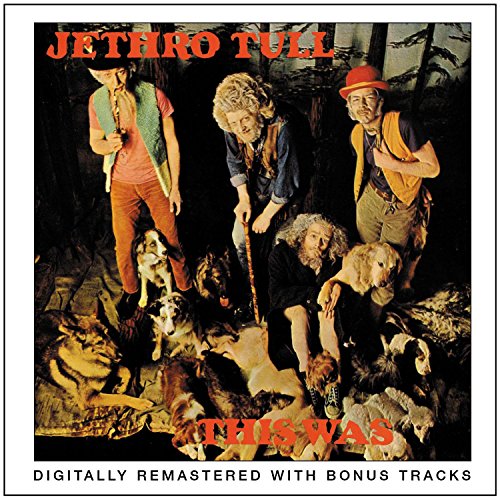 Jethro Tull's "This Was" album cover: band with dogs in a forest.