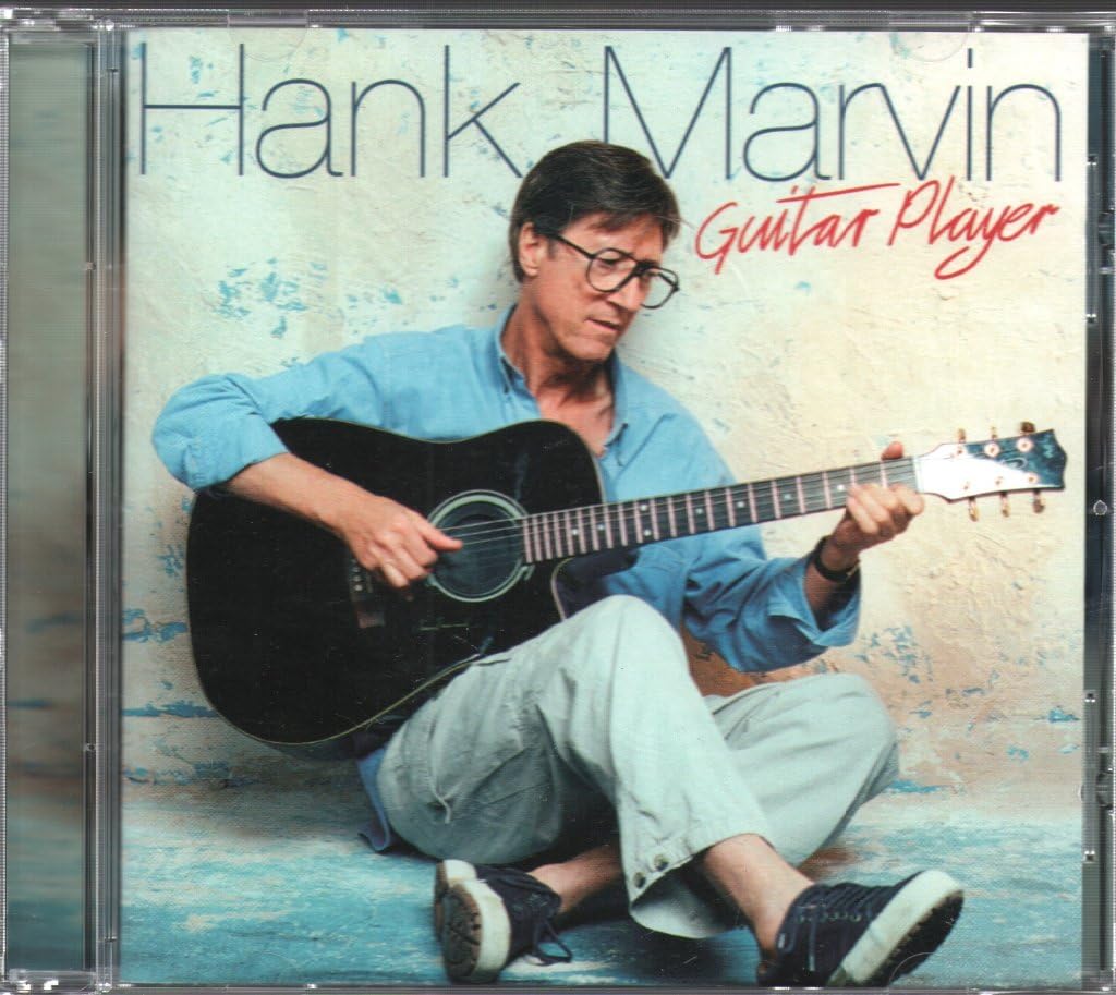 CD cover featuring Hank Marvin playing an acoustic guitar.