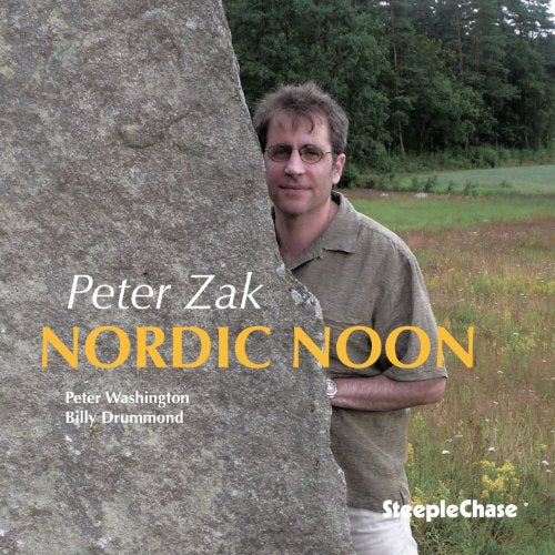 CD cover featuring Peter Zak leaning against a large stone monolith.