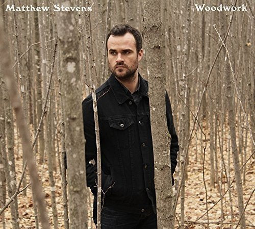 Matthew Stevens album cover, portrait of a man in a forest.