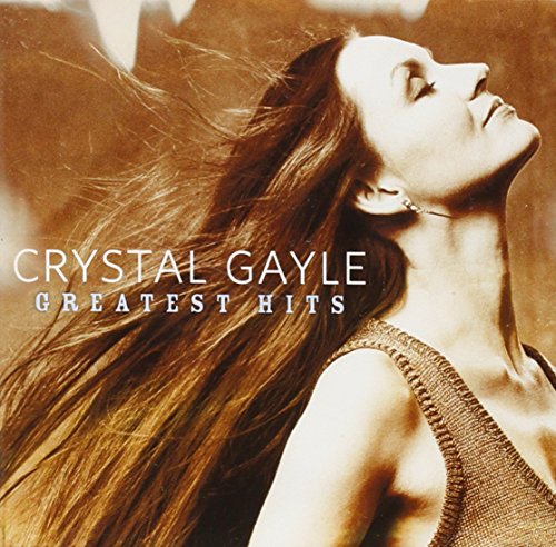 CD cover featuring Crystal Gayle with long, flowing hair looking upwards.