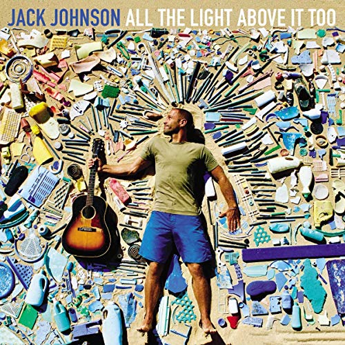 Jack Johnson album cover with a man holding a guitar amid plastic debris.