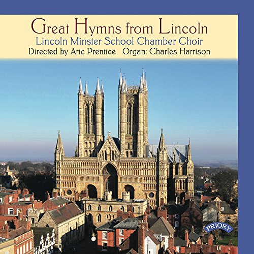CD cover: Lincoln Cathedral towers over a town, blue background.