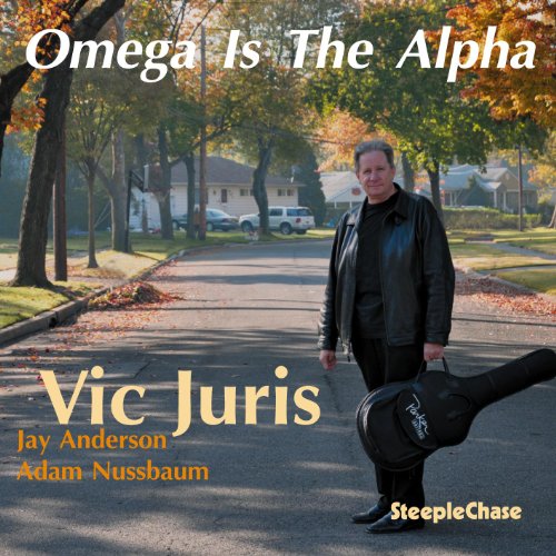 CD cover featuring Vic Juris with a guitar case on a residential street.
