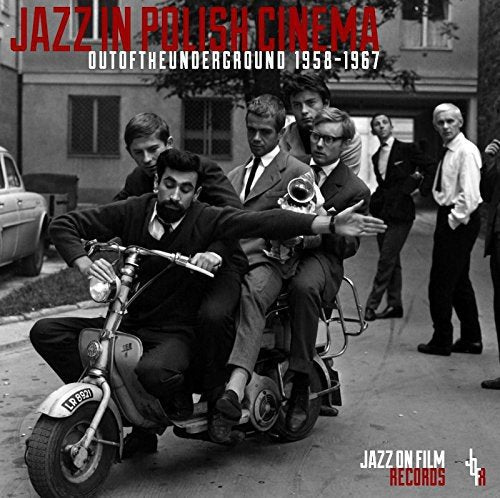 CD cover: black and white film still of men with a motorcycle.