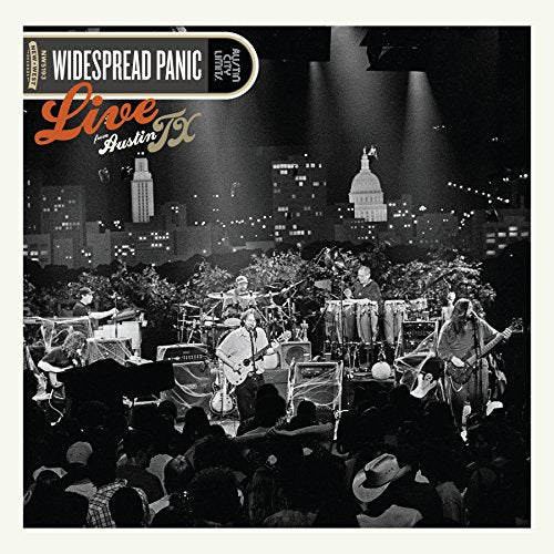 Widespread Panic live album cover featuring a band performing in Austin, Texas.