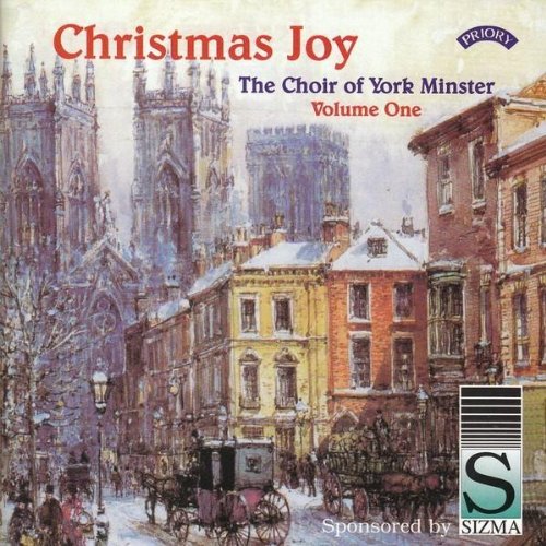CD cover for "Christmas Joy" featuring a snowy street scene and cathedral.