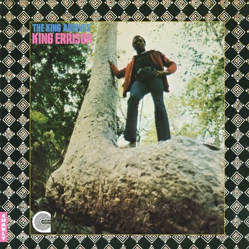 Album cover: Man leaning against a large tree, patterned border.