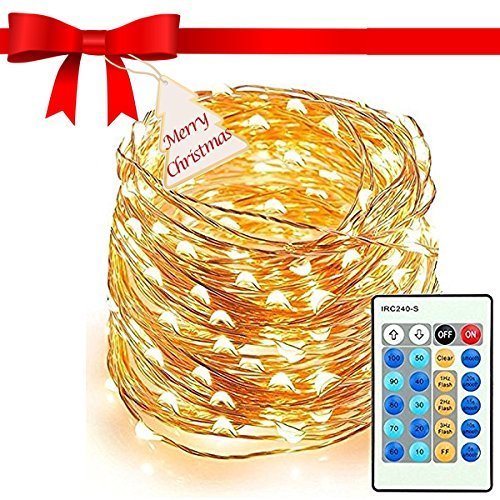 Coiled string lights with a remote control and Christmas ribbon.