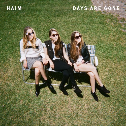 Haim album cover: three women with sunglasses sitting on a lawn chair.