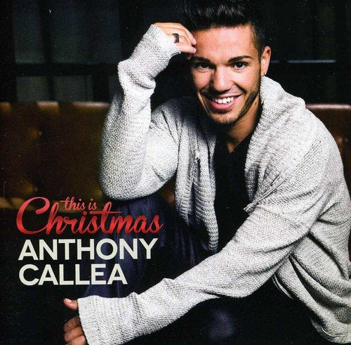 Anthony Callea smiling on album cover for “This Is Christmas.”