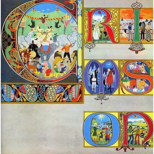 Medieval-style illuminated manuscript artwork featuring circus scenes and figures inside large decorative letters.