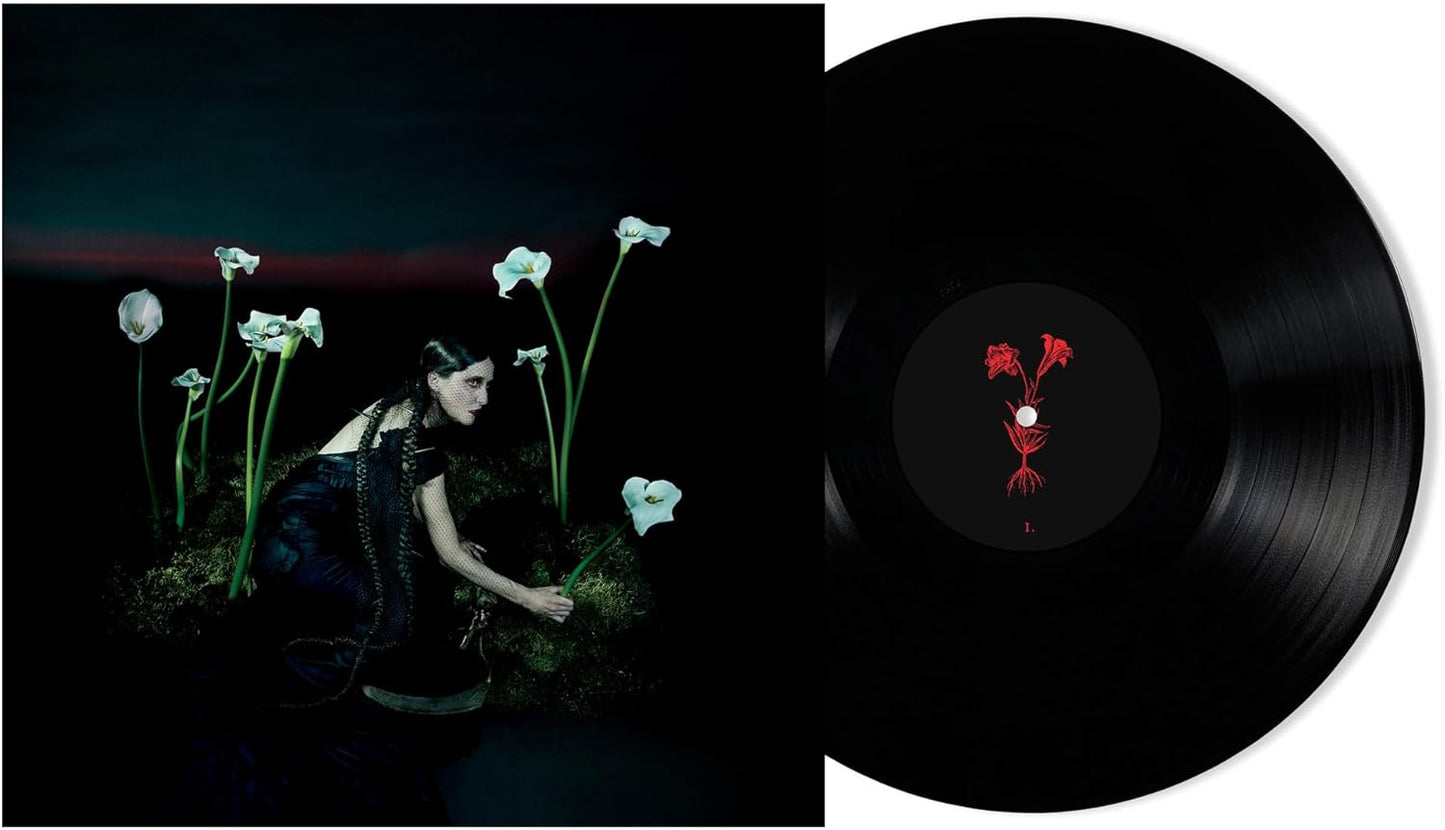 Vinyl record cover featuring a woman among white calla lilies.