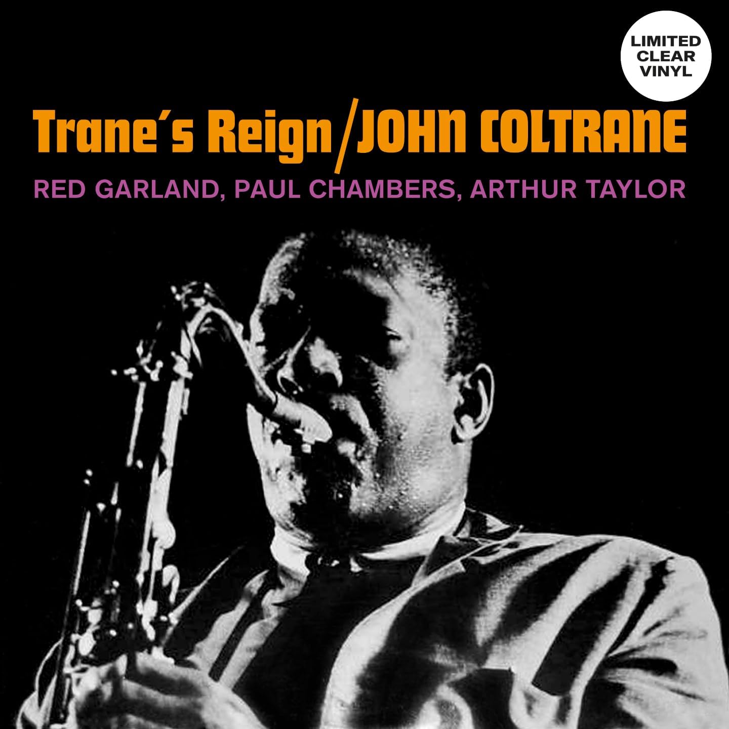 John Coltrane album cover, black and white portrait with saxophone.
