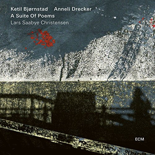 Album cover featuring abstract blue and white textures with red accents and dark silhouettes.