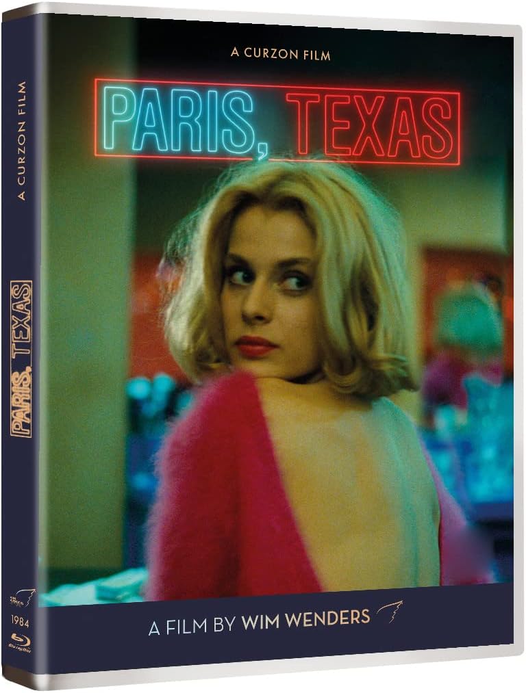 Blu-ray cover art featuring a blonde woman in a pink sweater looking back.