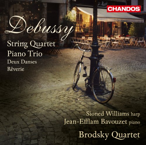 CD cover: bicycle leaning on a lamppost in a Parisian street.