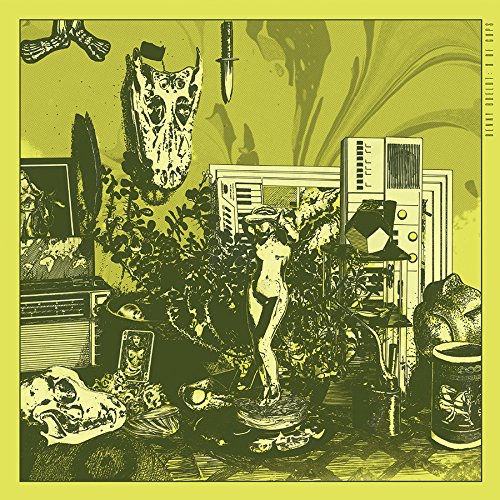 Yellow vinyl record cover with surreal collage of skulls and statues.
