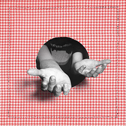 Ulrika Spacek album cover: arms reaching from a hole in red pattern.