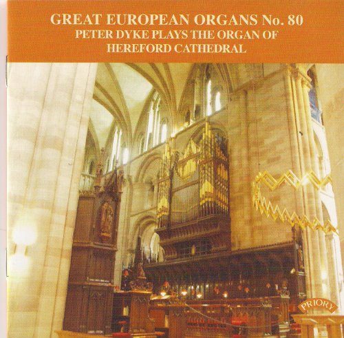 Hereford Cathedral organ viewed from within the stone-arched cathedral.