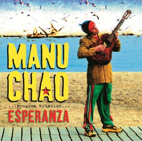 Manu Chao album cover: man with guitar on a boardwalk.