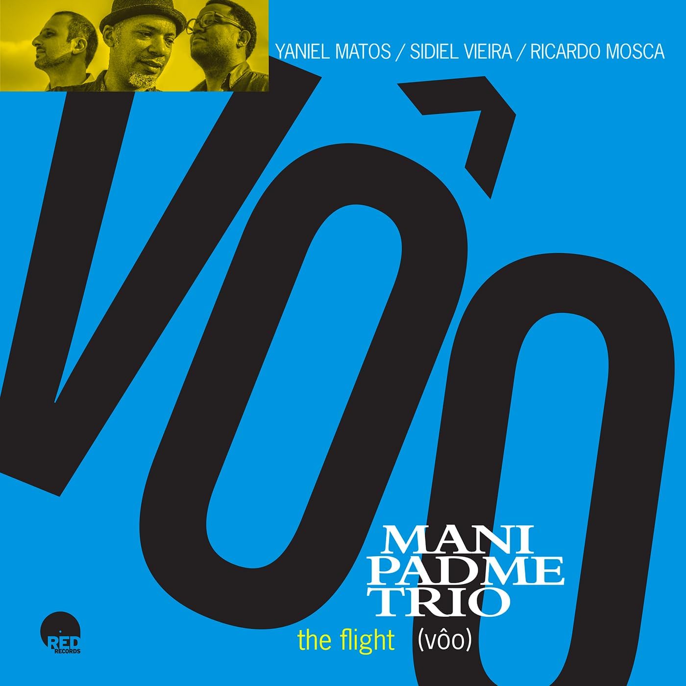 CD cover with three musicians’ portraits and bold red graphic design.