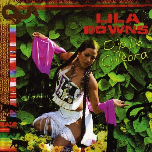 Lila Downs album cover, “Ojo De Culebra,” featuring a woman in white.