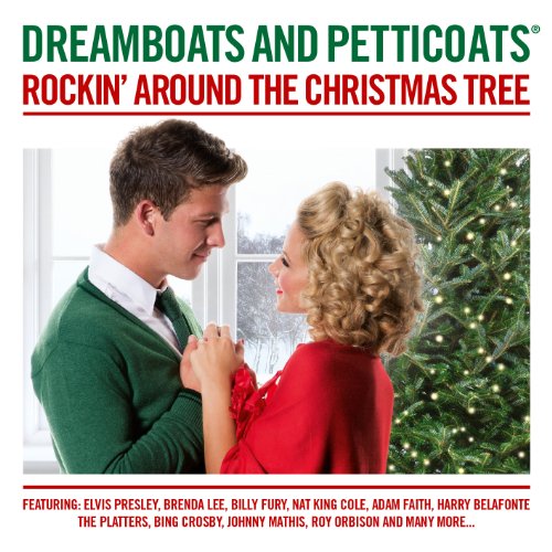 CD cover: couple dancing near a Christmas tree, red and green tones.