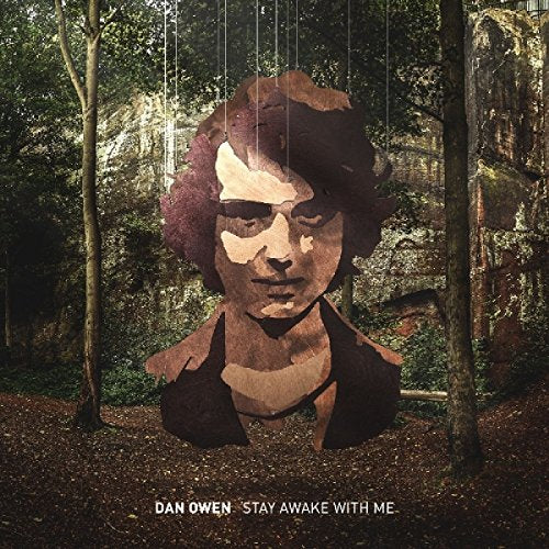 CD cover: portrait of a man in a forest, textured and faded.