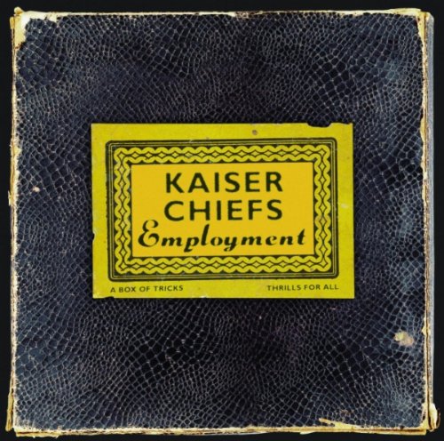 Kaiser Chiefs “Employment” CD cover: black textured background, yellow label.