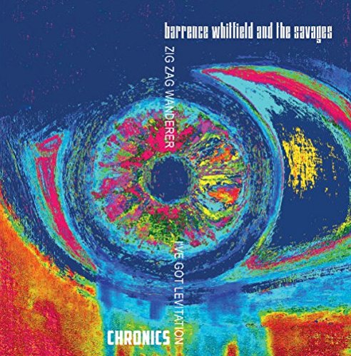 Album cover with swirling, colorful abstract eye design and text.