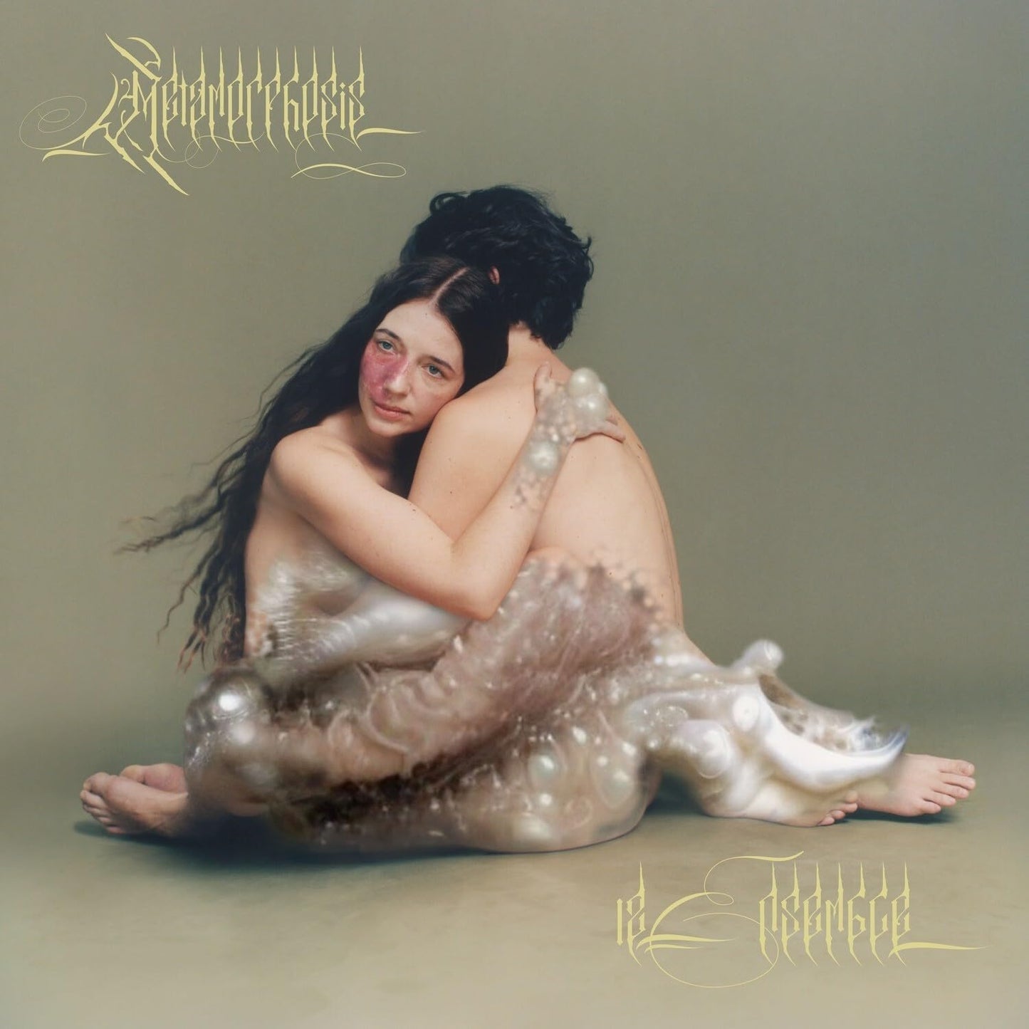 CD cover: person emerging from translucent material, pale green background.