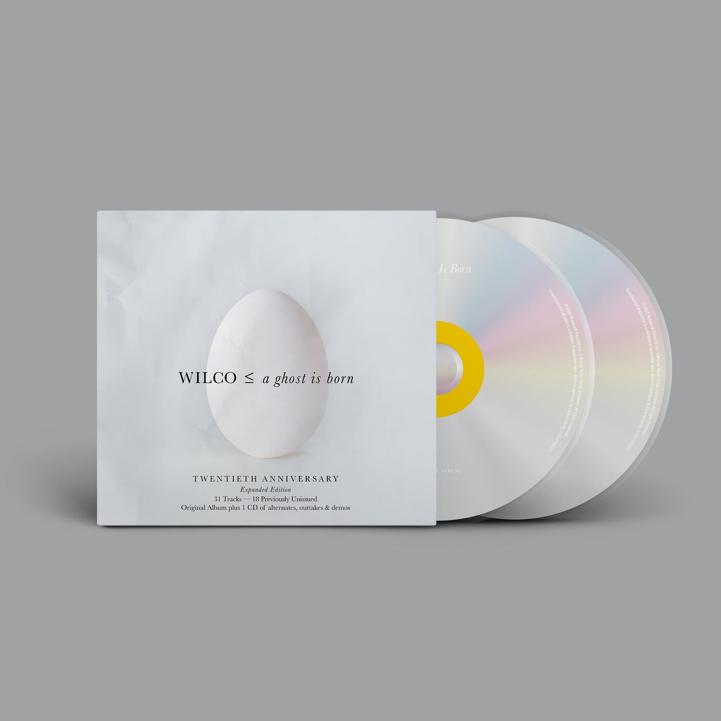 Wilco’s “A Ghost Is Born” CD case, featuring abstract yellow and white shapes.