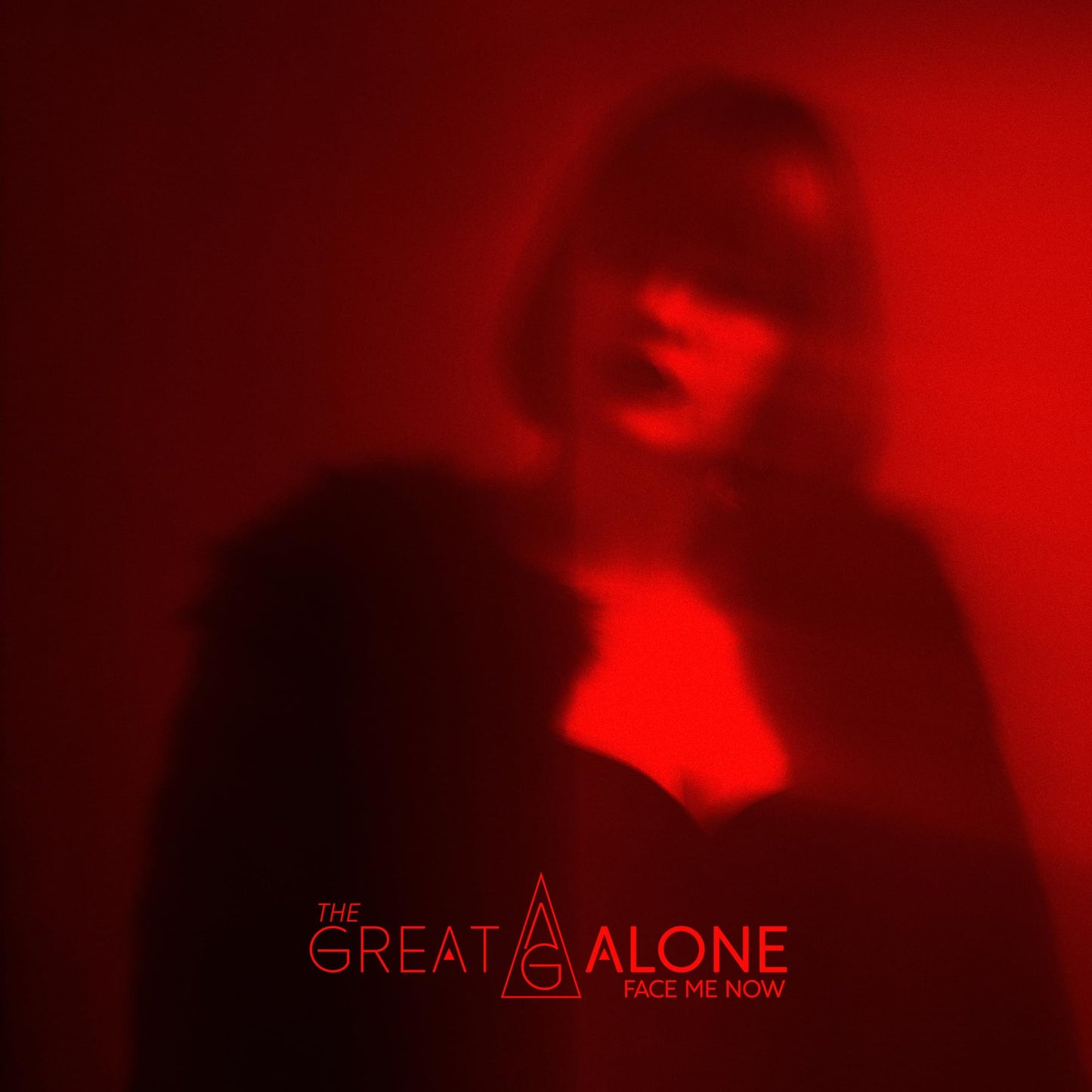 Red album cover featuring a blurred portrait of a person.