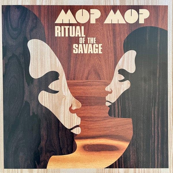 Vinyl record cover: "Mop Mop - Ritual Of The Savage" with faces in woodgrain.