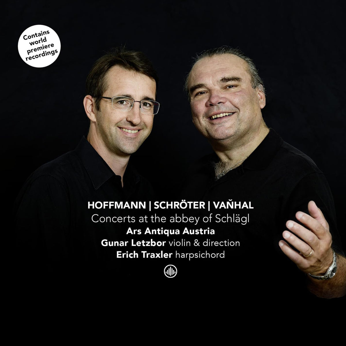 CD cover: two smiling men in black suits with text details.