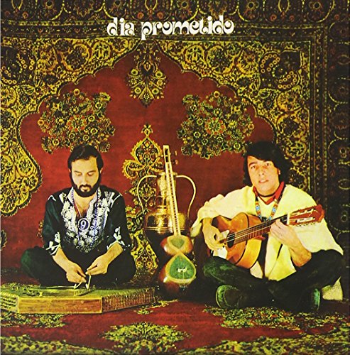 CD cover: two men with instruments seated on a patterned rug.